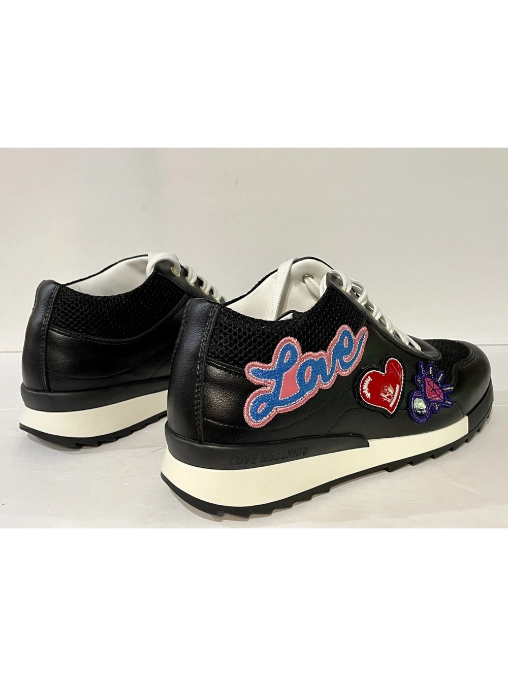 Love Moschino Black Leather Sneakers with Blue 'Love' Patch and Red Heart